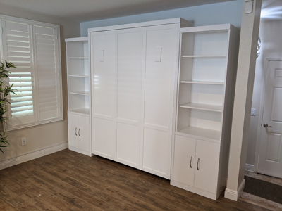 Shaker Murphy Wall Bed with Staggered Side Cabinets with Adjustable Shelves in Solid Bright White on Maple