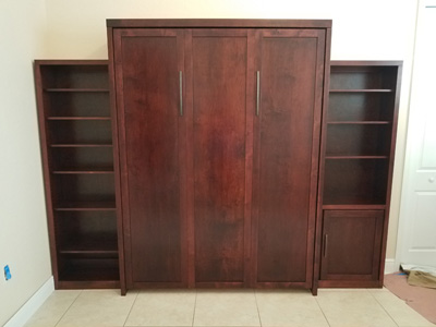 Mission Shaker 3 Panel Murphy Wall Bed, Flat Trim shown in Red Mahogany on Maple. Upgrade to Hidden Flip Leg, Long Oil Bronzed Handles.