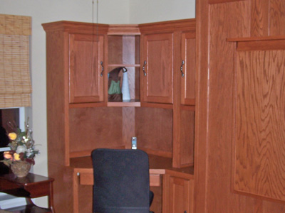 Mission Shaker Murphy Wall Bed and Home Office with Attached Fold Down Table shown in Cinnamon on Oak