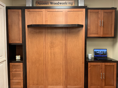 Shaker Two-Tone Murphy Wall Bed and Cabinets with Swing Out Desk Table shown in Cinnamon and Espresso on Maple