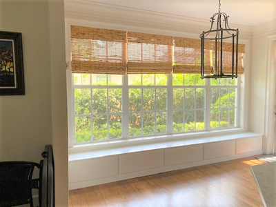 Custom Built-In Kitchen Banquette Window Seating and Storage shown Solid Bright White on Maple