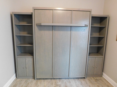 Custom Savona Vertical Queen Murphy Wall Bed and Side Cabinet with Shelf Leg shown in Gray Wash on Oak