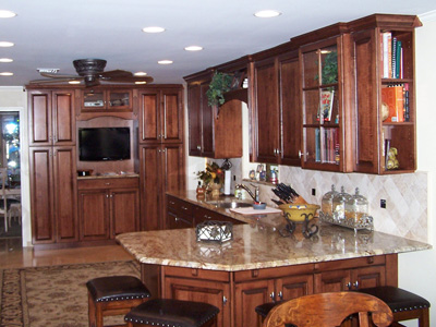 Custom Traditional Kitchen Wood Cabinets Shown in Maple with Custom Stain with Raised Panels