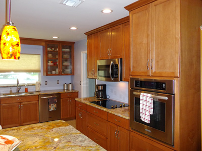 Shaker Kitchen Cabinetry shown in Cinnamon on Maple with Granite Counters