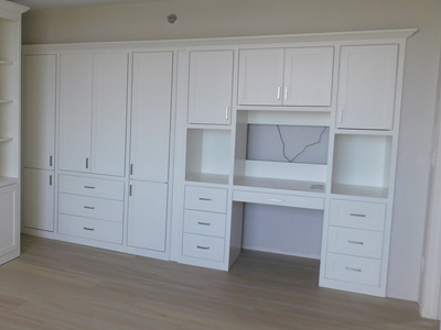 Custom Shaker Pedestal Desk, Wardrobe Cabinets shown in Solid Pure White on Maple and Flat Trim