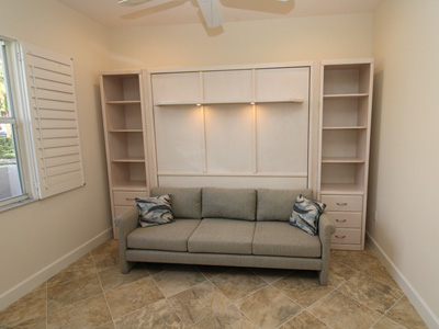 Savona Queen Sofa Murphy Wall Bed and Side Pier Cabinet, Crown Molding with Lighted Shelf Leg shown in Whitewash on Oak