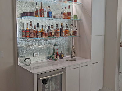 Custom Bar Area & Modern Cabinetry shown in Solid Pure White on Maple