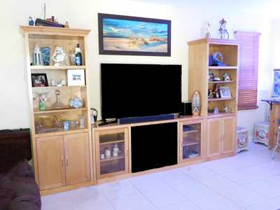 Custom Mission Shaker Entertainment Center with Fireplace Shown in Light Cinnamon on Maple