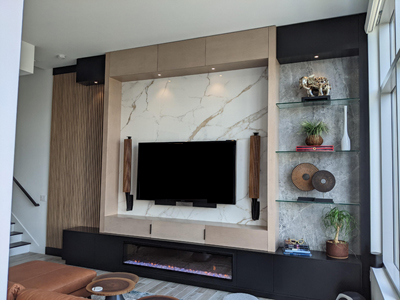 Custom Built-In Modern Entertainment Center Wall Unit shown in Solid Black, Antique Barrel and Ledge Rock on Maple