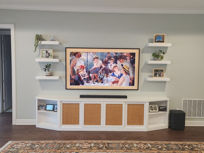 Custom Center TV Console with 3 Openings, 4 Shaker Panel Doors with Wicker Fronts Shown in Bright White on Maple