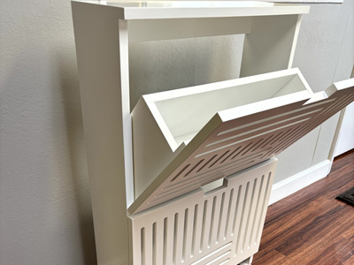 Custom Shoe Cabinet with 2 Tilt Out Shelves with Finger Pulls for Shoe Storage shown in Bright White on Maple