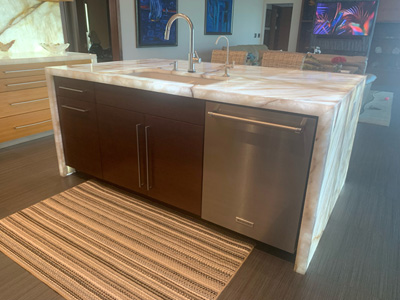 Custom Kitchen Island Cabinet with ¾” Maple Euro Boxes with Flat Fronts with Walnut Horizontal Grain shown in Custom Stain to Color Match (Dark Walnut)