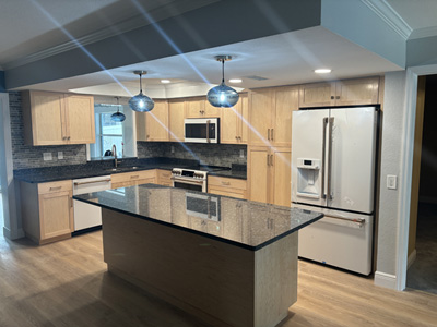 Custom Shaker Kitchen Cabinets and Drawers shown in Natural Stain on Maple