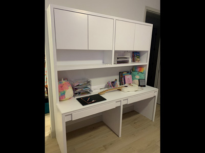 Custom Savona Window Bench Seat with Lift Up Stay Up Lid with Soft Close Hinges and Desk Shown in Whitewash on Oak with Nickel Pulls