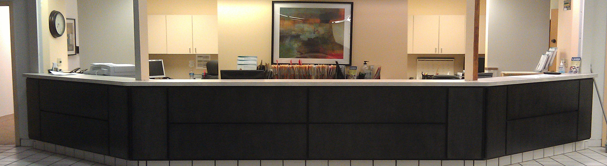 Commercial Modern Style Reception Desk Shown in Espresso Stain on Oak Accent Woodworking Largo Florida Banner