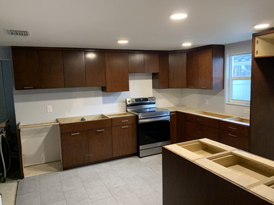 Custom Modern Kitchen Cabinets shown in Custom Color Match with Satin Nickel Pulls, Soft Close Door Hinges, Undermount Soft Close Drawer Glides, Quartz Countertops