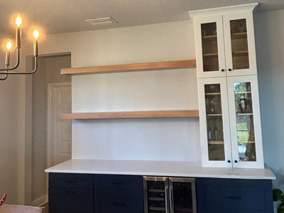 Euro Floating Shelves with Hidden French Cleats for Support shown in Natural Stain on Oak