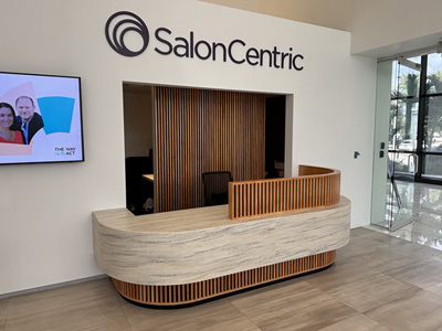 Custom Modern Office Security Reception Desk shown in Wilsonart Laminate Loft Oak and Durasein Countertop in Boardwalk
Soft Close Doors and Drawers