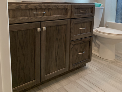 Custom Mission Bathroom Vanity Cabinet shown in Warm Toffee on Oak with Satin Nickel Pulls