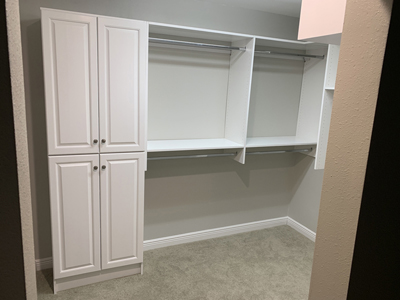 Made to Order Real Wood Walk-In Closet System with Traditional Raised Panel Doors and Open Shelves Shown in Accent Bright White on Maple with Satin Nickel Knobs