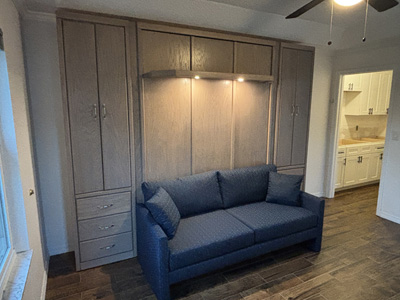 Savona Queen Sofa Murphy Wall Bed with Lighted Shelf Leg shown in Driftwood on Oak
