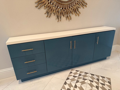 Accent Woodworking Custom Modern Credenza with Flat Panel Doors and Drawers Shown in Silken Peacock and Bright White on Maple with Champagne Bronze Pulls