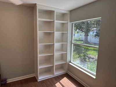 Custom Shaker Open Bookcase with Center Partition, Flat Trim shown in Greek Villa on Maple